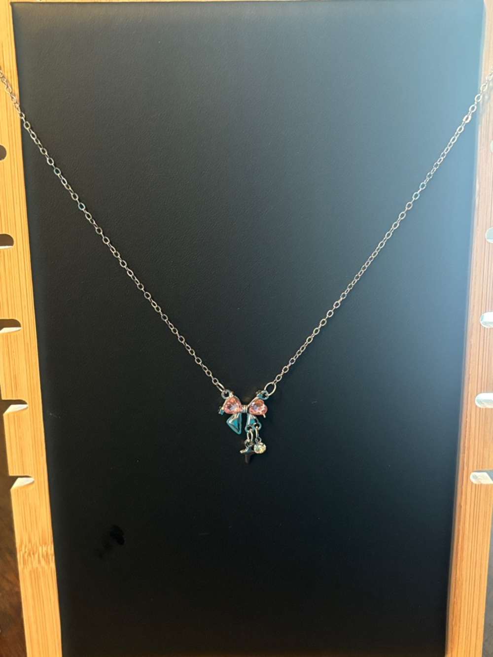 Silver Necklace with Pink Flower and Teal Leaf Charms